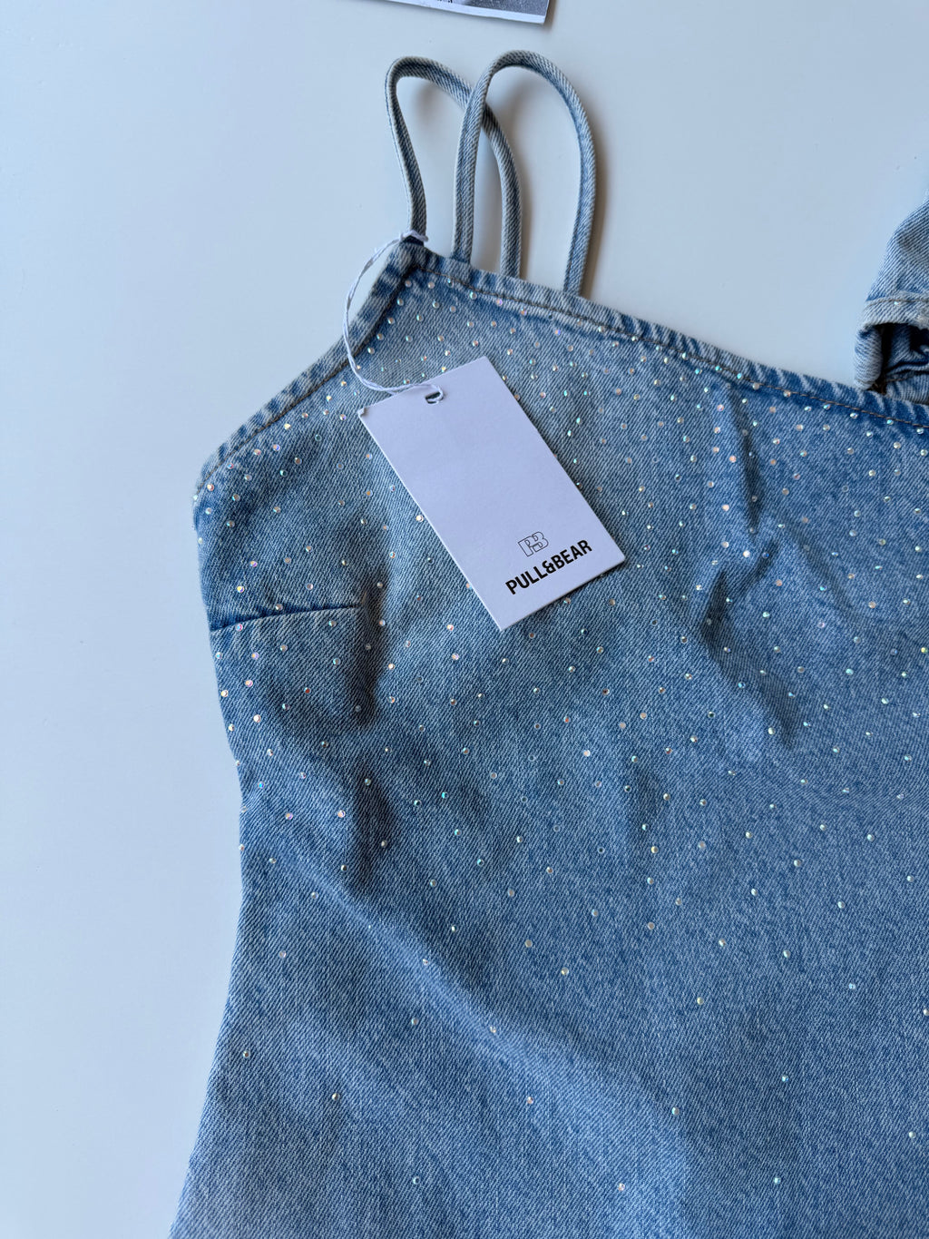 Top asimetrico denim